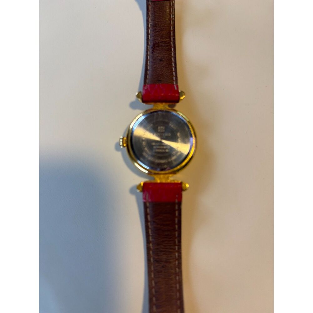 Vintage Givenchy Gold Tone Casing with Ruby Colored Gemstones Accent Watch - Picture 7 of 8
